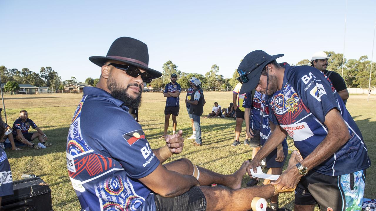 Dwayne Duncan tended to by Alf Orcher. 2023 TRL Cultural Cup, SW Qld Emus vs Pacific Nations Toowoomba. Saturday, February 25, 2023. Picture: Nev Madsen.