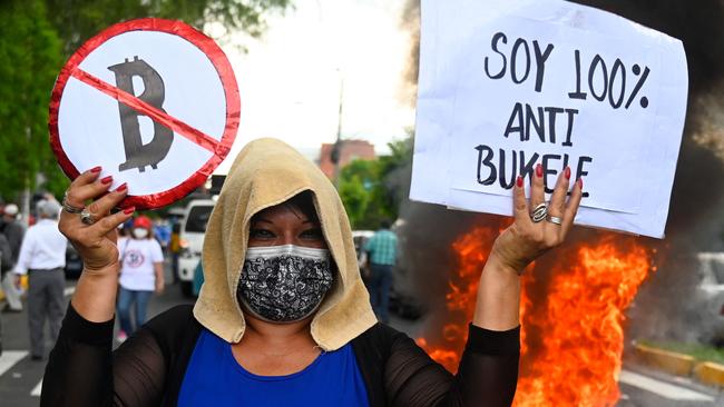 A woman protests against the circulation of bitcoin in San Salvador. Picture: AFP