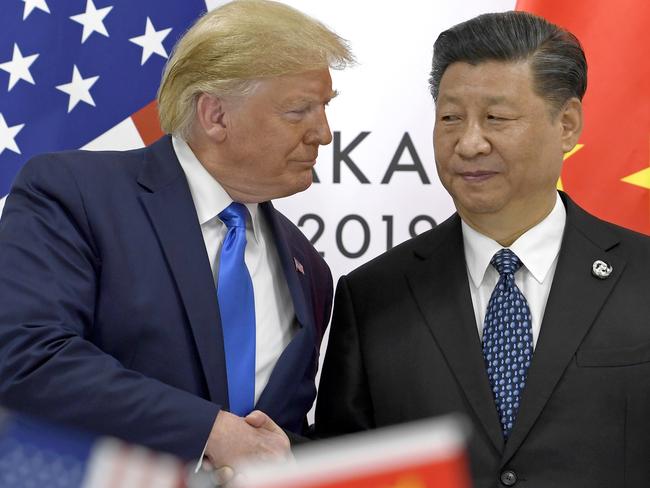 US President Donald Trump, left, and Chinese President Xi Jinping have agreed to talks. Picture: AP