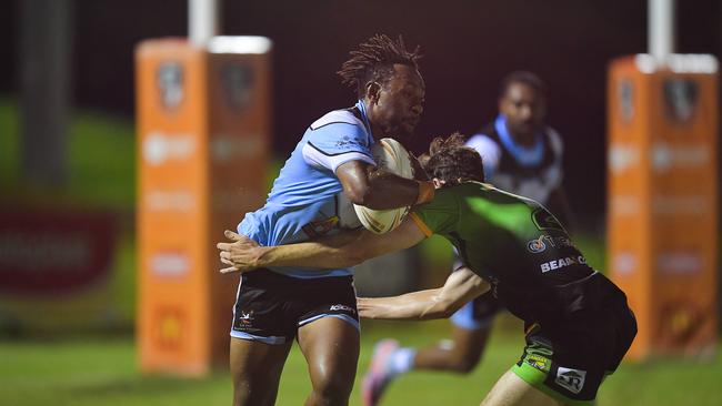 Northern Sharks’ fullback Cooper Segeyaro takes on the Palmerston Raiders in Round 1 of the 2023 NRL NT season. Picture: Pema Tamang Pakhrin