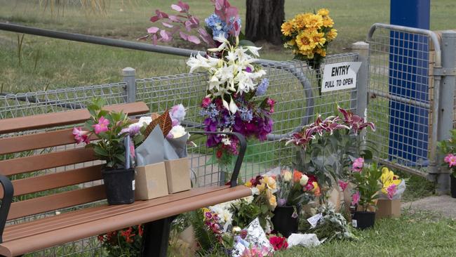 Flowers left at Tara Police Station on Tuesday. Picture: Nev Madsen