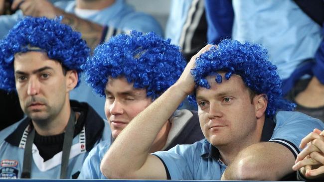  NSW fans show their feelings after the Blues lost game three of the NSW v Queensland State of Origin series at ANZ Stadium, ...