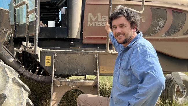 Dan Kennedy of Yerong Creek in southern NSW is pictured windowing canola. Picture: Nikki Reynolds