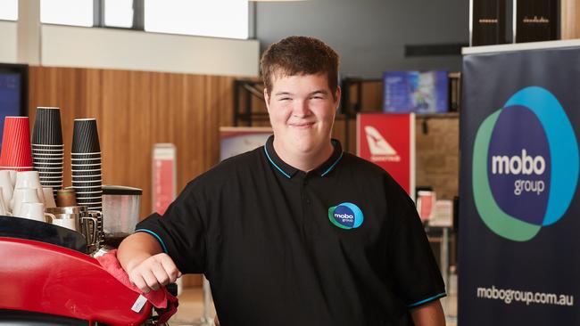 Mobo group client, Beau Christiansen poses for a picture at Kangaroo Island Airport where he works at the cafe. Picture: Matt Loxton