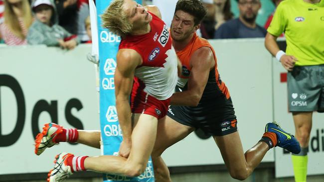 Isaac Heeney cannons into the goalpost. Picture: Phil Hillyard