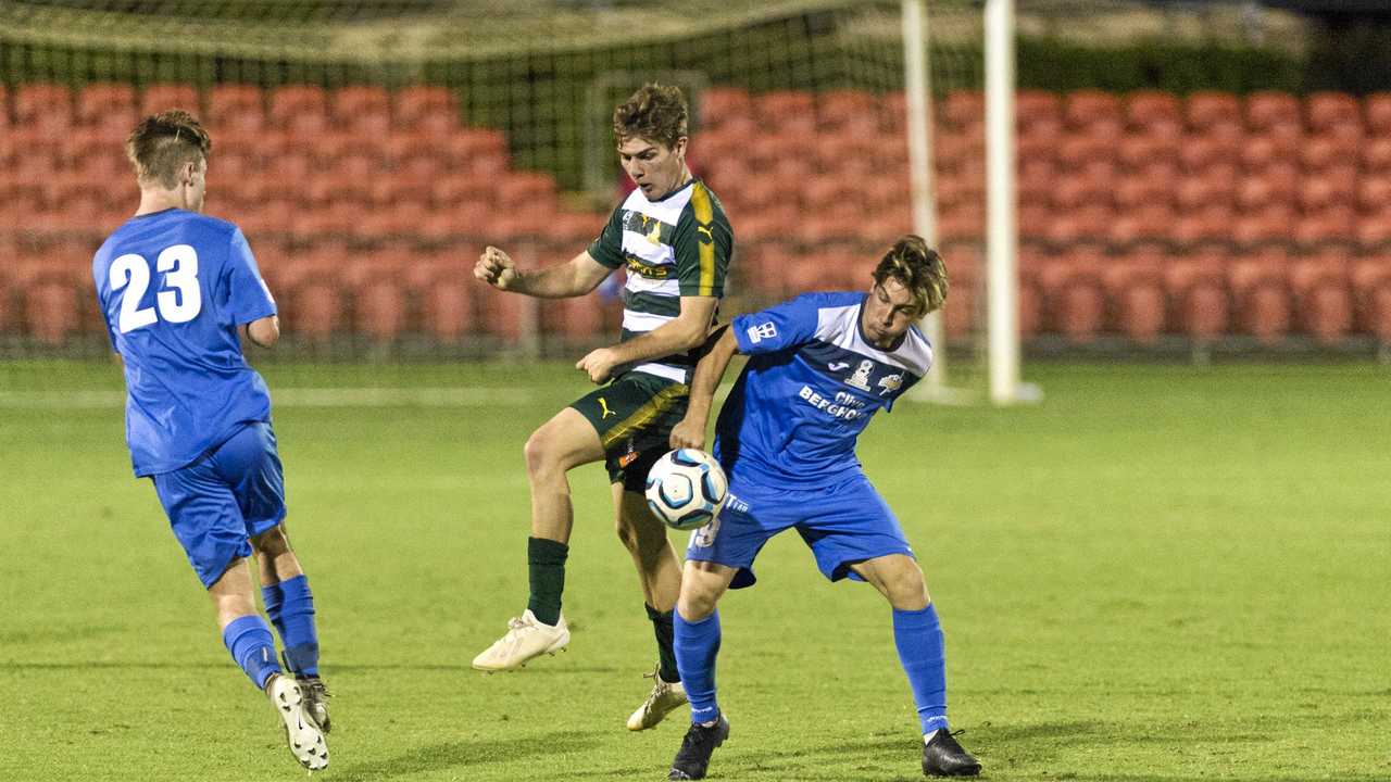 GOAL SCORER: South West Queensland Thunder forward Luke Lister (right) competes for the ball with the Western Pride's Alex Parsons. Lister scored in the Thunder's 3-1 loss to Peninsula Power on Saturday. Picture: Kevin Farmer