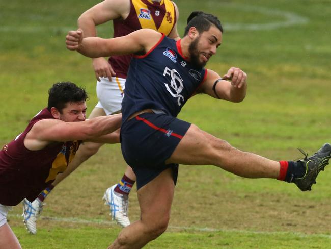 June 29, Southern FNL: Springvale Districts v Murrumbeena .9 Sam Raru kicks the ball for Springvale Districts.Picture: Stuart Milligan