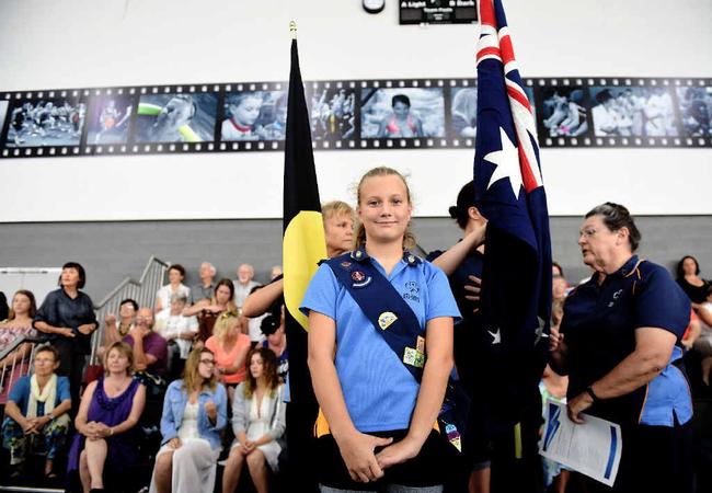 MARKING AUSTRALIA DAY: Girl Guide Lauryn Bromhead gets ready to lead the flag procession at the Australia Day ceremony in Lismore. There was a large turnout for the event at the Goonellabah Aquatic and Sport Centre.