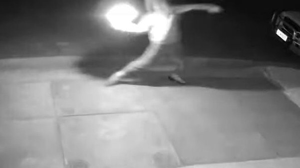 The vision shows the suspect lobbing the molotov at the home. Picture: SA Police