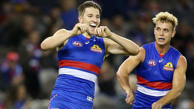 Marcus Bontempelli and Mitch Wallis celebrate a goal. Picture: Michael Klein