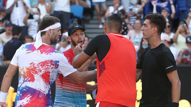 Opponent Michael Venus (left) left no doubt about his feelings about Nick Kyrgios.