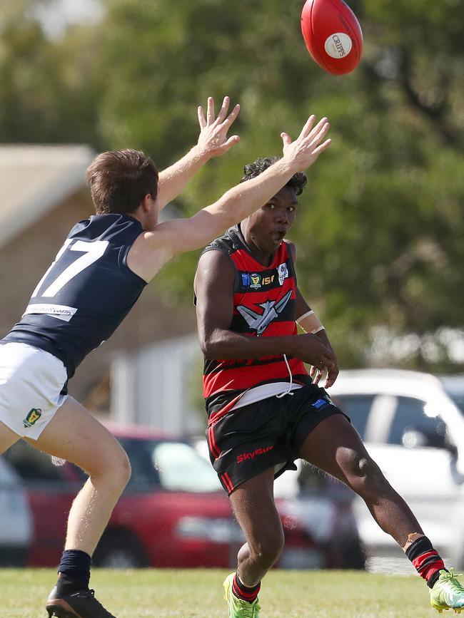 Henry Kerinaiua of Lauderdale and Brendan Taylor of Launceston in Saturday’s Lauderdale V Launceston Tasmanian State League match. Picture: NIKKI DAVIS-JONES