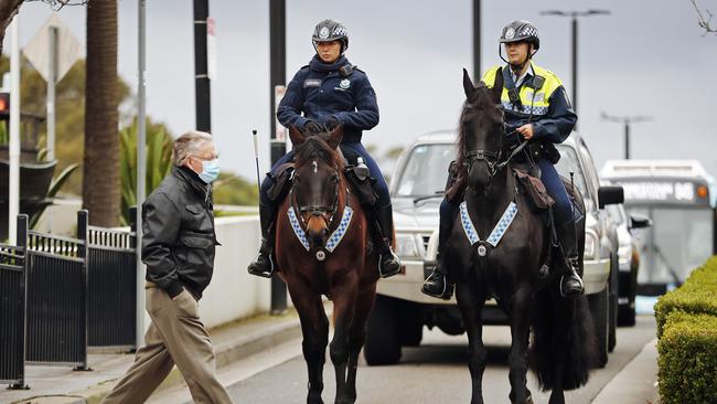 Mounted police officers patrol the streets of Bankstown, one of the Covid hot zones. Picture: Sam Ruttyn