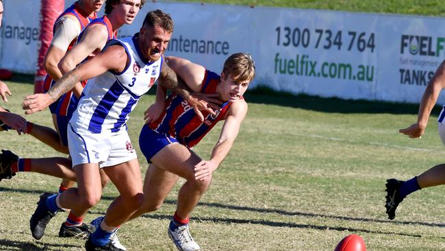 Mt Gravatt player Frazer Neate and Wilston player Tyler Galligan Saturday June 5, 2021. Picture, John Gass