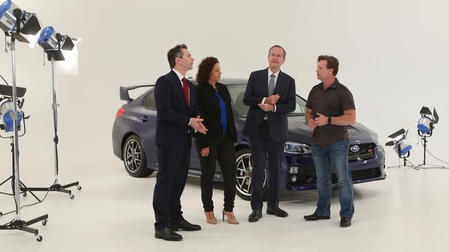 Labor federal MPs Jason Clare and Michelle Rowland, Opposition Leader Bill Shorten and Warren Kirby, owner of The Good Egg Studio. Picture Kym Smith