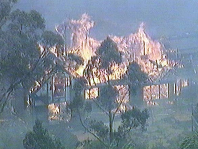 A Dandenong Ranges home fully ablaze in the devastating 1997 fires. Picture: Channel Nine