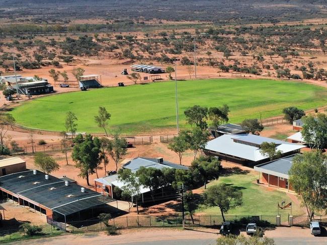 Melbourne Football Club has been working with the Santa Teresa community, near Alice Springs, to resurface their oval with grass to become the ‘MCG of Central Australia’. Picture: Supplied