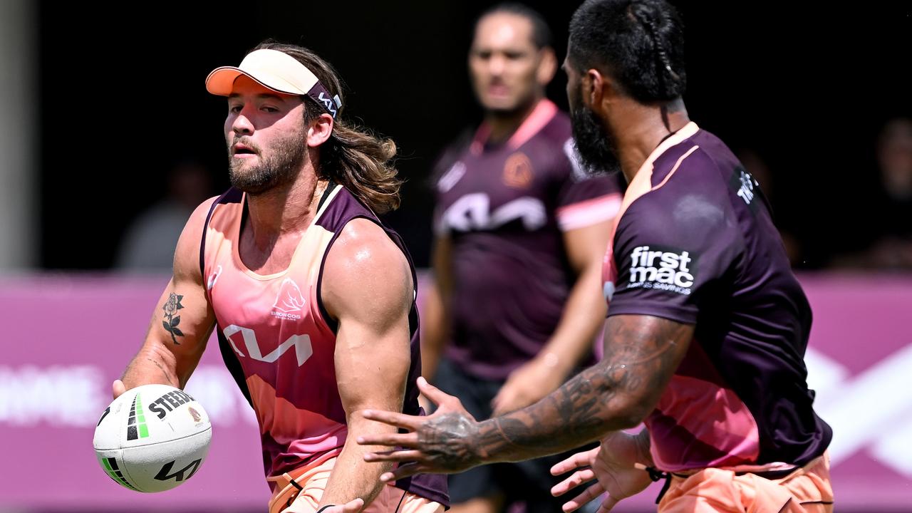 BRISBANE, AUSTRALIA - JANUARY 10: Patrick Carrigan passes the ball to Payne Haas during a Brisbane Broncos NRL training session at Red Hill on January 10, 2024 in Brisbane, Australia. (Photo by Bradley Kanaris/Getty Images)