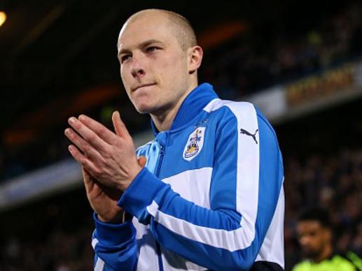 Aaron Mooy in action for Huddersfield.