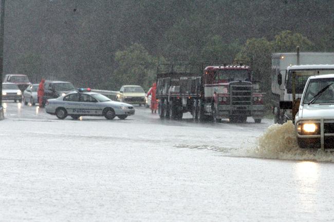JUNE 30, 2005:Flooding on the Gold Coast. The Pacific Highway at Tallebudgera. Pic Michael Ross
