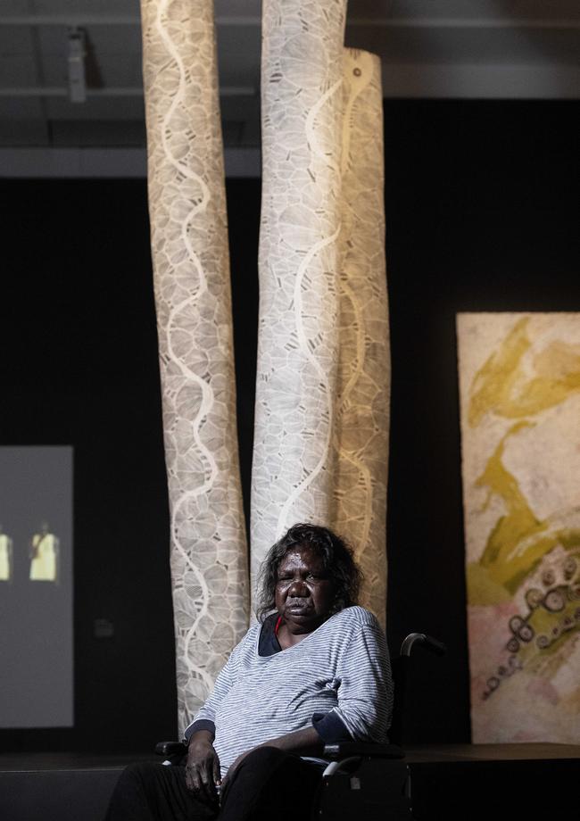 Wandjuk Marika three-dimensional winner Mataluba Gumana with artwork Rainbows in the Lillies. Picture: Keri Megelus