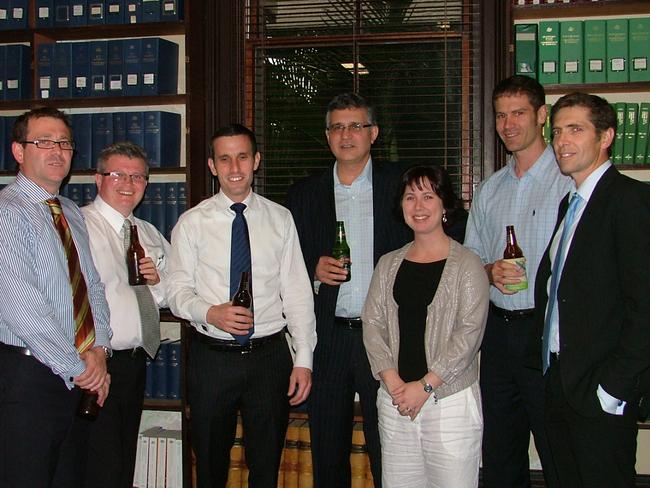 File image: Barristers from Rockhampton's Old Supreme Court Chambers drink a toast to welcome barrister, Jordan Ahlstrand. From left, (now District Court Judge) Jeff Clarke, Tony Arnold, Jordan Ahlstrand, head of chambers Ross Lo Monaco, Maree Willey, Tom Polley and (now Supreme Court judge, Justice) Graeme Crow. Photo by Jenny Lightfoot.