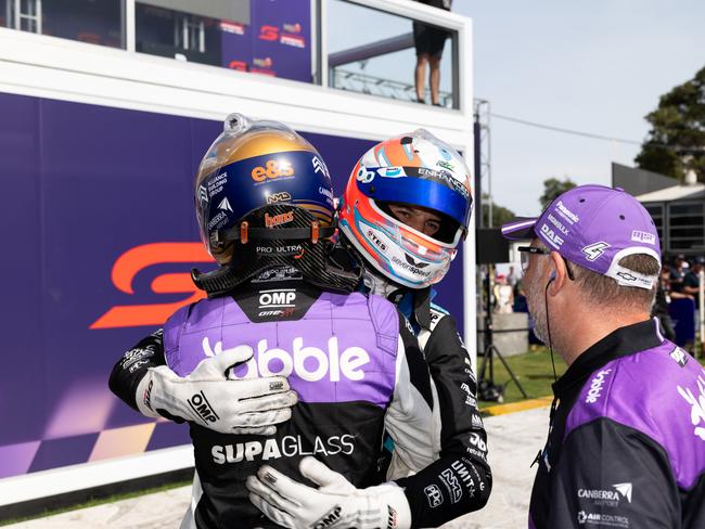 Cameron Hill and Nick Percat embrace after Hill’s breakthrough win at Albert Park. Picture: Getty Images