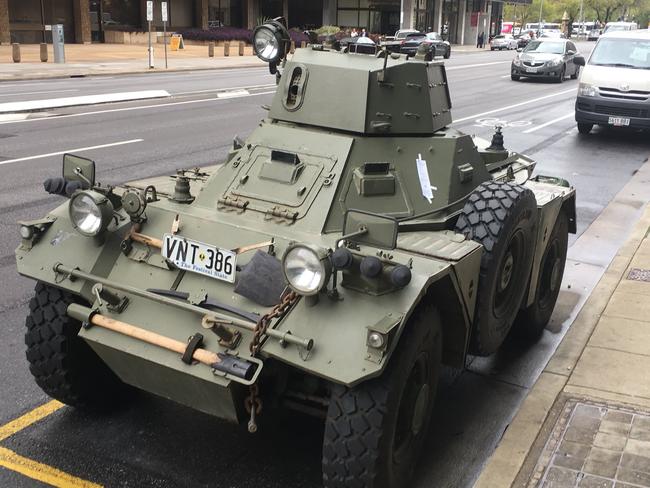 The Daimler armoured car parked on Flinders St in the city — with its parking ticket stuck to the side of the cabin. Picture: Mitch Mott.