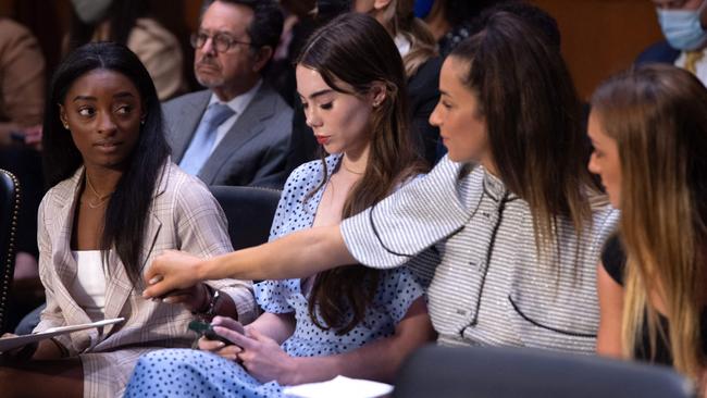 US Olympic gymnasts Simone Biles, McKayla Maroney, Aly Raisman and Maggie Nichols testify during a Senate hearing in 2021. Photo by SAUL LOEB / POOL / AFP