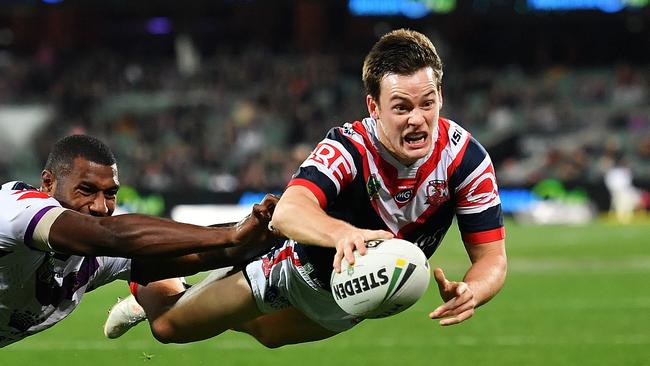 Luke Keary of the Roosters attempts to score a try.