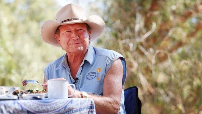 Mining magnate Andrew ‘Twiggy’ Forrest where he is happiest — beside a campfire at his property Minderoo in northwest West Australia. Picture: Rohan Kelly