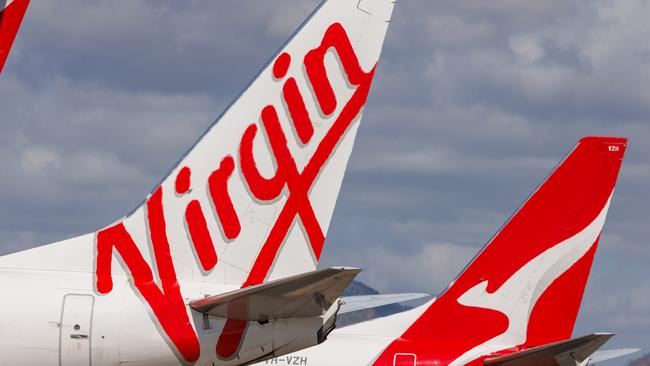 Townsville, Queensland - 28 July 2021: Virgin Australia and Qantas tails on display at Townsville Airport in far North Queensland27 October 2024Kendall HillPhoto - Getty Images