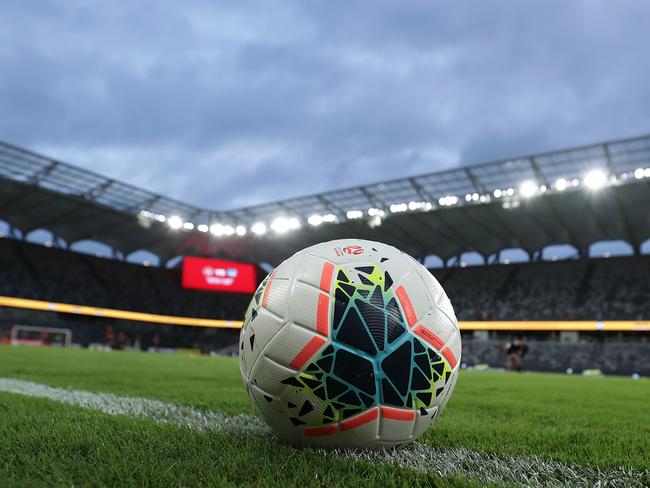 SYDNEY, AUSTRALIA - MARCH 21: A football is seen on the sideline of an empty Bankwest Stadium ahead of the round 24 A-League match between the Western Sydney Wanderers and Sydney FC at Bankwest Stadium on March 21, 2020 in Sydney, Australia. (Photo by Mark Metcalfe/Getty Images)