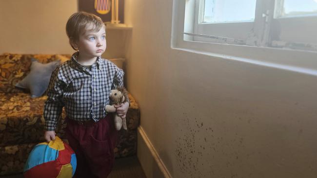 Sarah Young’s three year old son next to mould due to lack of proper ventilation, heating and cooling in their rental.