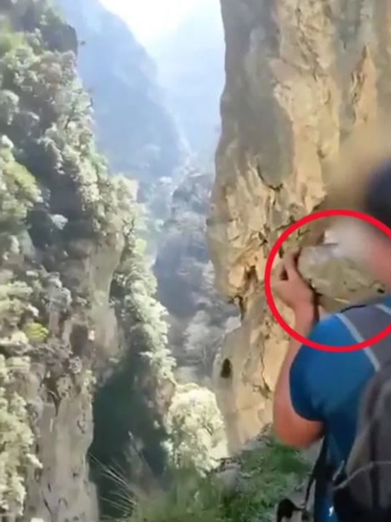 Seconds after the large stone was tossed, a deafening bang was heard as it hit the ground several metres below.
