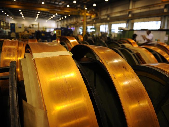 Rolls of ___ copper, which is used to make copper busbars in electrical systems (?), in the Luvata plant in Johor, Malaysia, on Monday, May 13, 2013. Photographer: Munshi Ahmed/Bloomberg