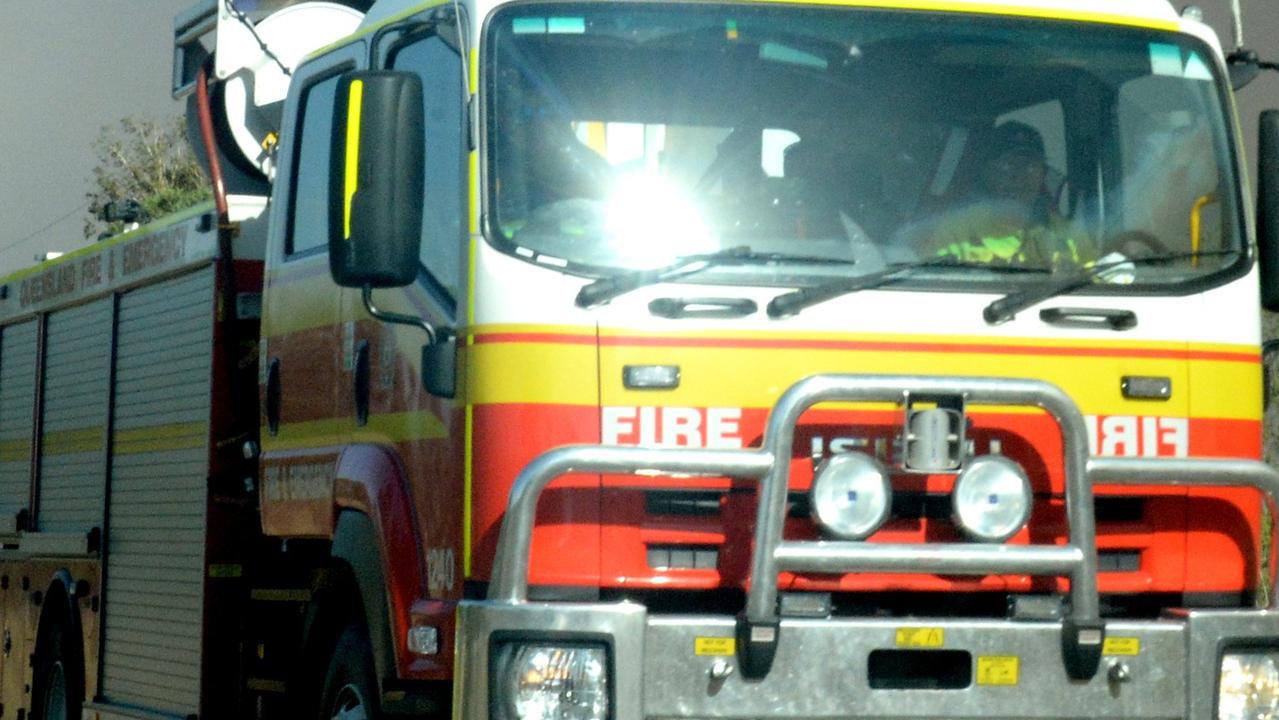 Bushfire sparked by Bruce Hwy car rollover threatens home