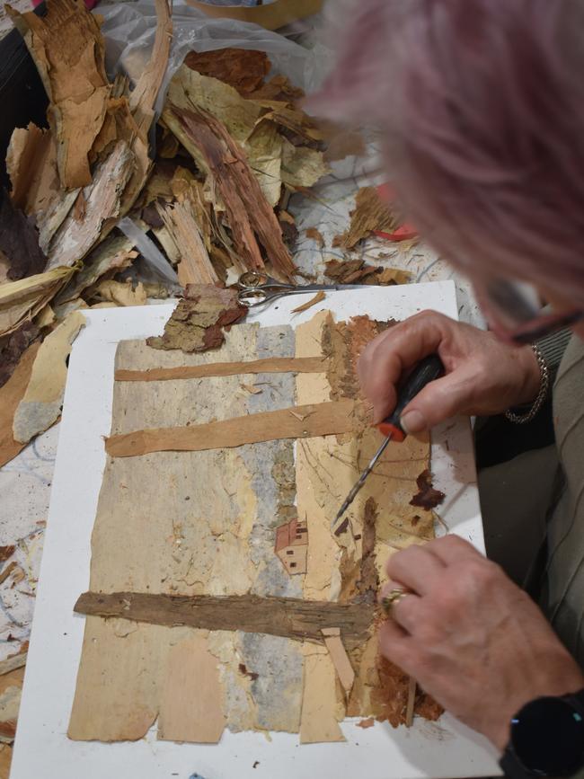 All the action from the 150th Ipswich Show on the 20th of May 2023, featuring Roslyn Leisemann doing art in bark. Photographed by Georgie Walker.