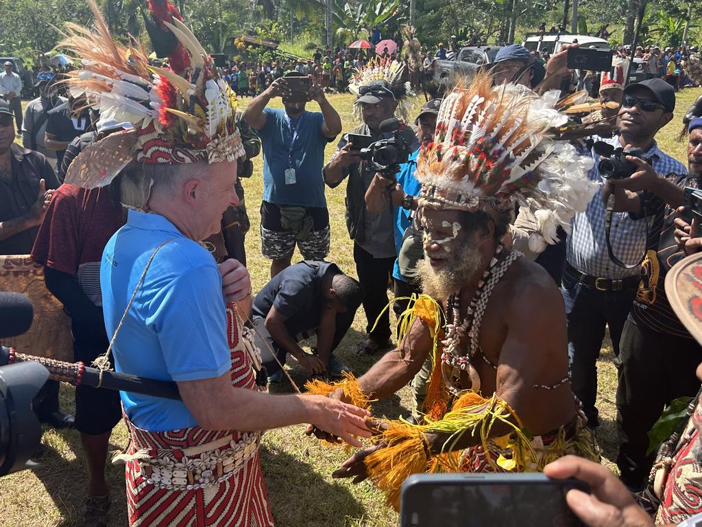 Mr Albanese was presented with gifts from tribal leaders at Kokoda Village. Picture: Warren Brown