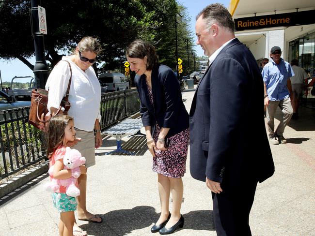 NSW Premier Gladys Berejiklian met locals during a visit to the Central Coast yesterday with Terrigal State Liberal MP Adam Crouch. Picture: Sue Graham.