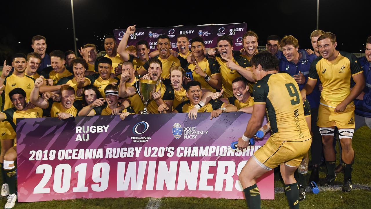 Australian players celebrate winning the Oceania U20 Championship.