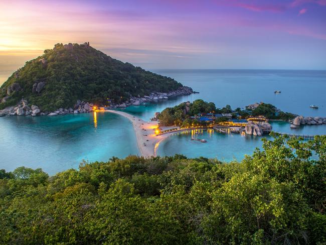 The white sand beach of Nang Yuan Island, an eight-minute taxi boat ride from Koh Tao, is one district that hides a macabre secret. Picture: Istock