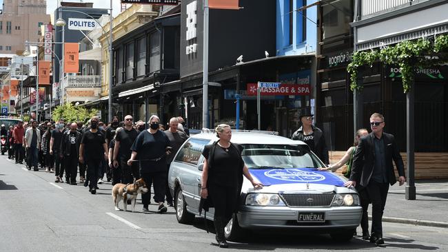 The protesters walk down Hindley St, angry at Covid restrictions they say are killing the industry. Picture: Tricia Watkinson