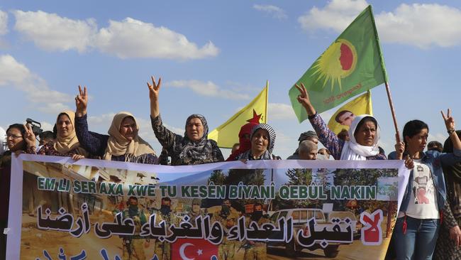 Kurdish women protest against possible Turkish military operation on Kurd held areas at the Syrian-Turkish border. Picture: AP.