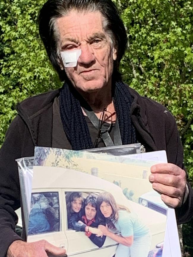 Beatles superfan Mark Baker, 69, of Osborne, with his photos. Picture: George Yankovich