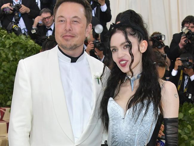 NEW YORK, NY - MAY 07:  Elon Musk and Grimes attend the Heavenly Bodies: Fashion & The Catholic Imagination Costume Institute Gala at The Metropolitan Museum of Art on May 7, 2018 in New York City.  (Photo by Neilson Barnard/Getty Images)