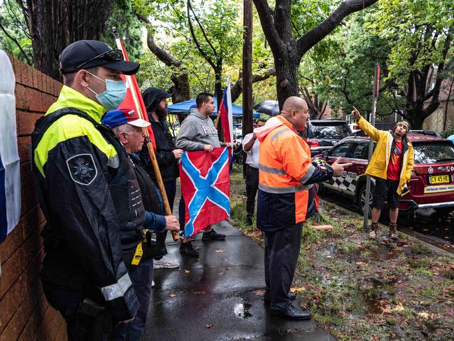 SYDNEY, AUSTRALIA - NewsWire Photos, FEBRUARY 26, 2022: Ukrainian supporter (right) confronts Russian supporters in response to the war in Ukraine, outside the Russian Consulate in Sydney  Picture: NCA NewsWire / Flavio Brancaleone