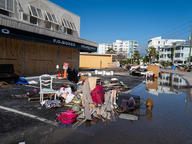 Damaged household goods sit outside as clean up from hurricanes Helene and Milton continues along the Gulf Coast. Picture: AFP