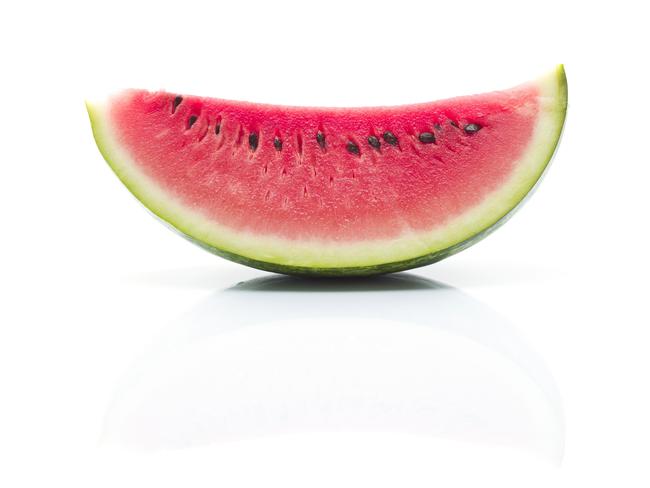 Slice of watermelon on white background