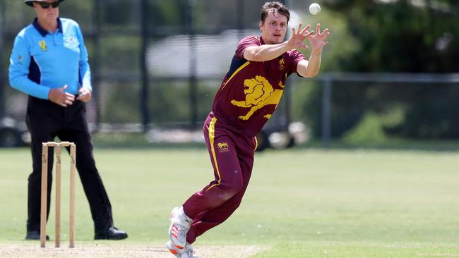 Premier: Fitzroy Doncaster’s Harrison Goad fielding off his own bowling. Picture: Georg Sal